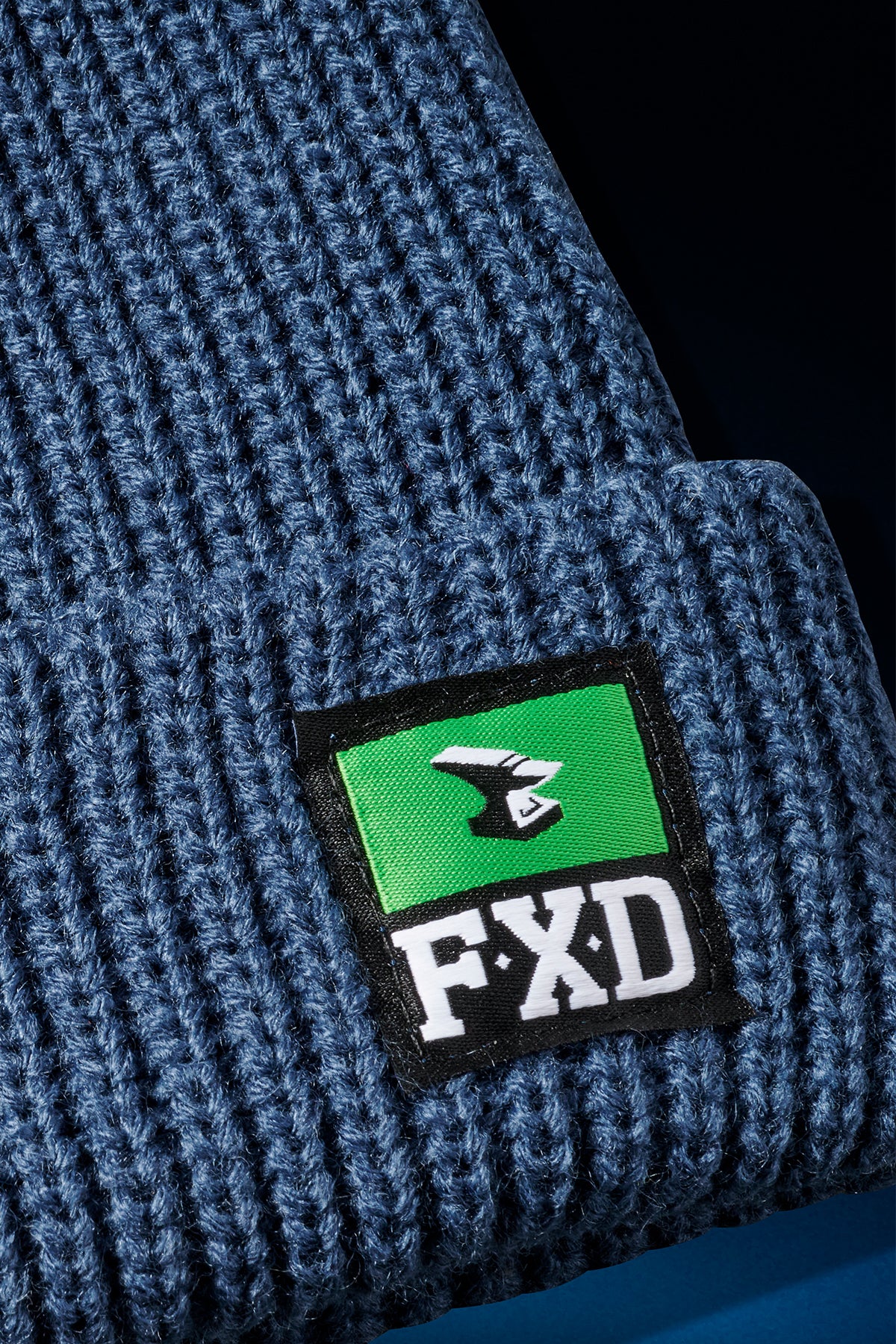 FX72509031-NAVY-DETAIL-LOGO-blue-background.jpg